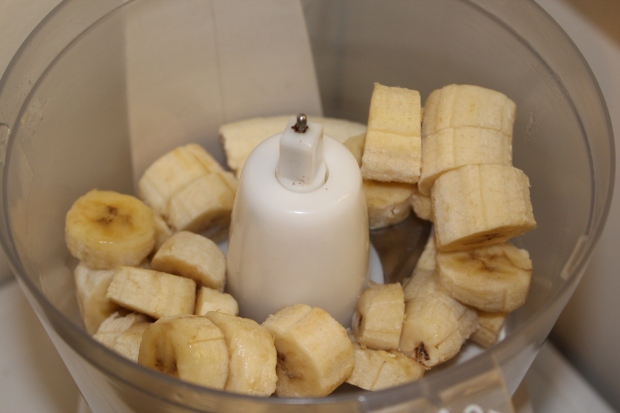 Add the frozen bananas into the food processor